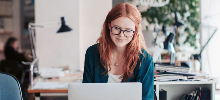 A person looking at a computer finding choices for accounting software
