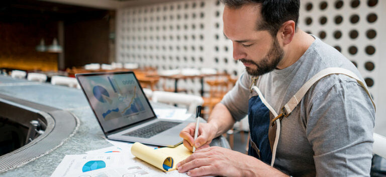 man analysing financial key performance indicators