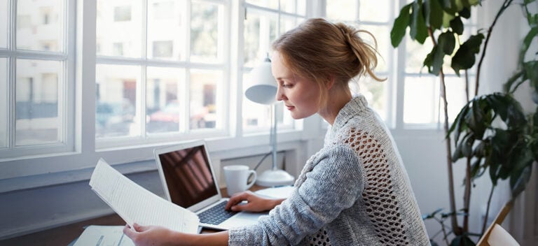 Small business owner reviewing tax details