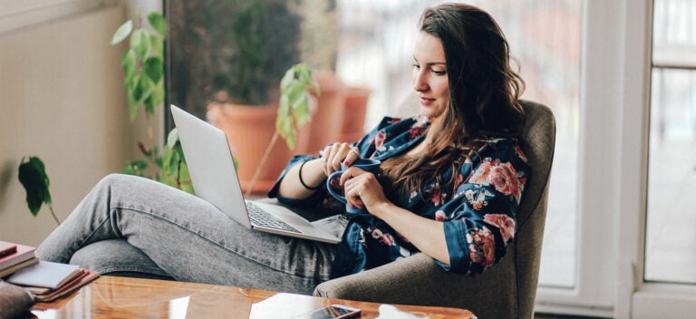 A woman with laptop studying no-doc business loans and low-doc business loans